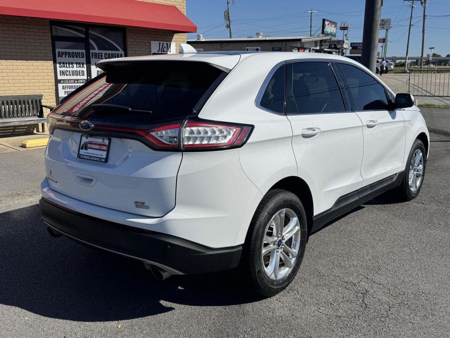 2016 White Ford Edge (2FMPK3J94GB) with an 4-Cyl EcoBoost 2.0L engine, Auto, 6-Spd SelShft transmission, located at 8008 Warden Rd, Sherwood, AR, 72120, (501) 801-6100, 34.830078, -92.186684 - Photo#7