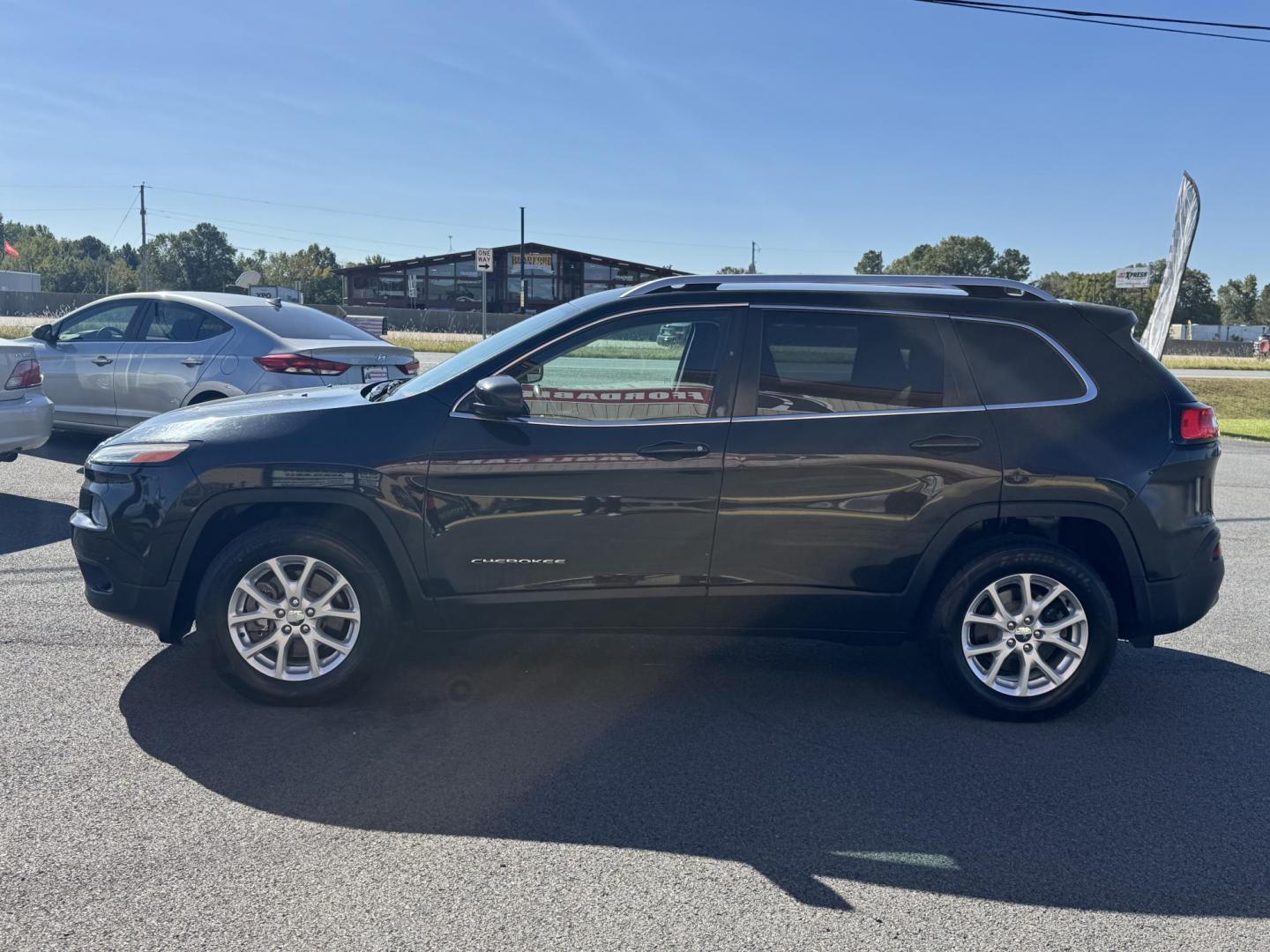 2014 Black Jeep Cherokee (1C4PJMCS1EW) with an V6, 3.2 Liter engine, Automatic, 9-Spd transmission, located at 8008 Warden Rd, Sherwood, AR, 72120, (501) 801-6100, 34.830078, -92.186684 - Photo#2