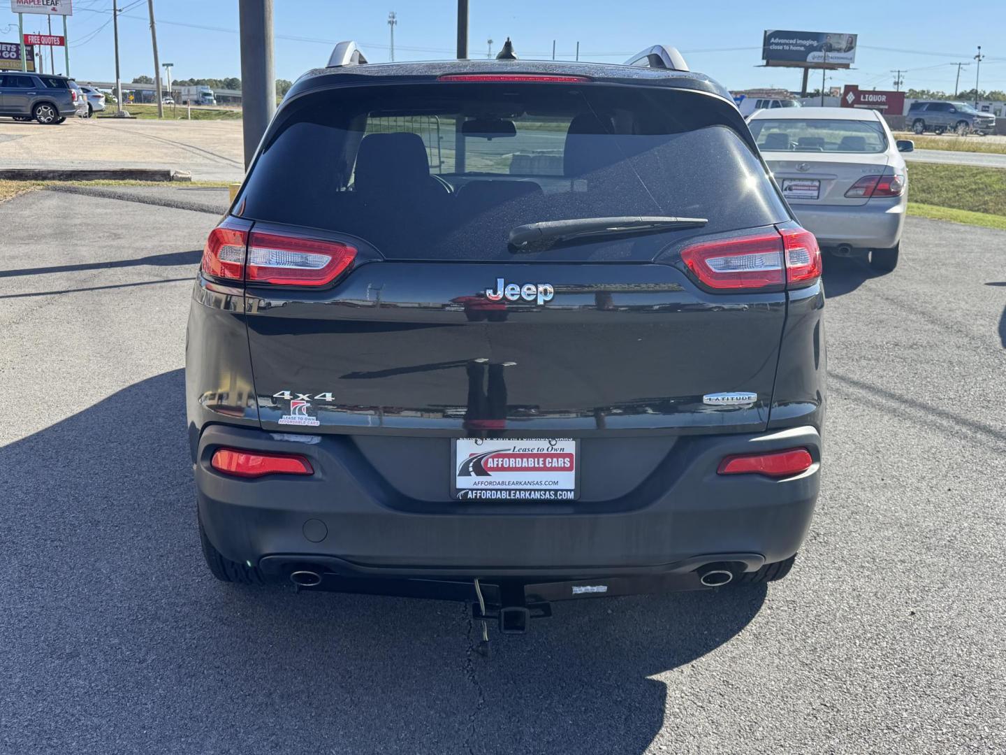 2014 Black Jeep Cherokee (1C4PJMCS1EW) with an V6, 3.2 Liter engine, Automatic, 9-Spd transmission, located at 8008 Warden Rd, Sherwood, AR, 72120, (501) 801-6100, 34.830078, -92.186684 - Photo#4