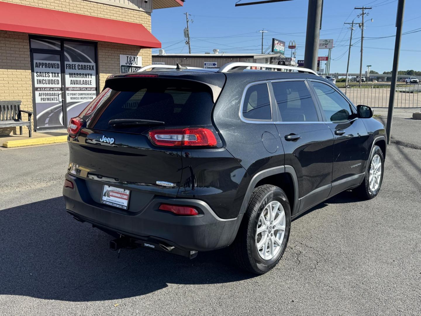 2014 Black Jeep Cherokee (1C4PJMCS1EW) with an V6, 3.2 Liter engine, Automatic, 9-Spd transmission, located at 8008 Warden Rd, Sherwood, AR, 72120, (501) 801-6100, 34.830078, -92.186684 - Photo#5