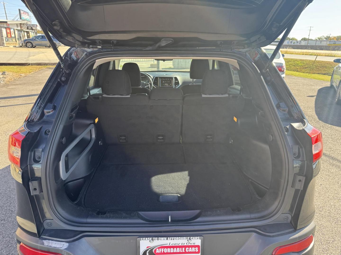 2014 Black Jeep Cherokee (1C4PJMCS1EW) with an V6, 3.2 Liter engine, Automatic, 9-Spd transmission, located at 8008 Warden Rd, Sherwood, AR, 72120, (501) 801-6100, 34.830078, -92.186684 - Photo#8