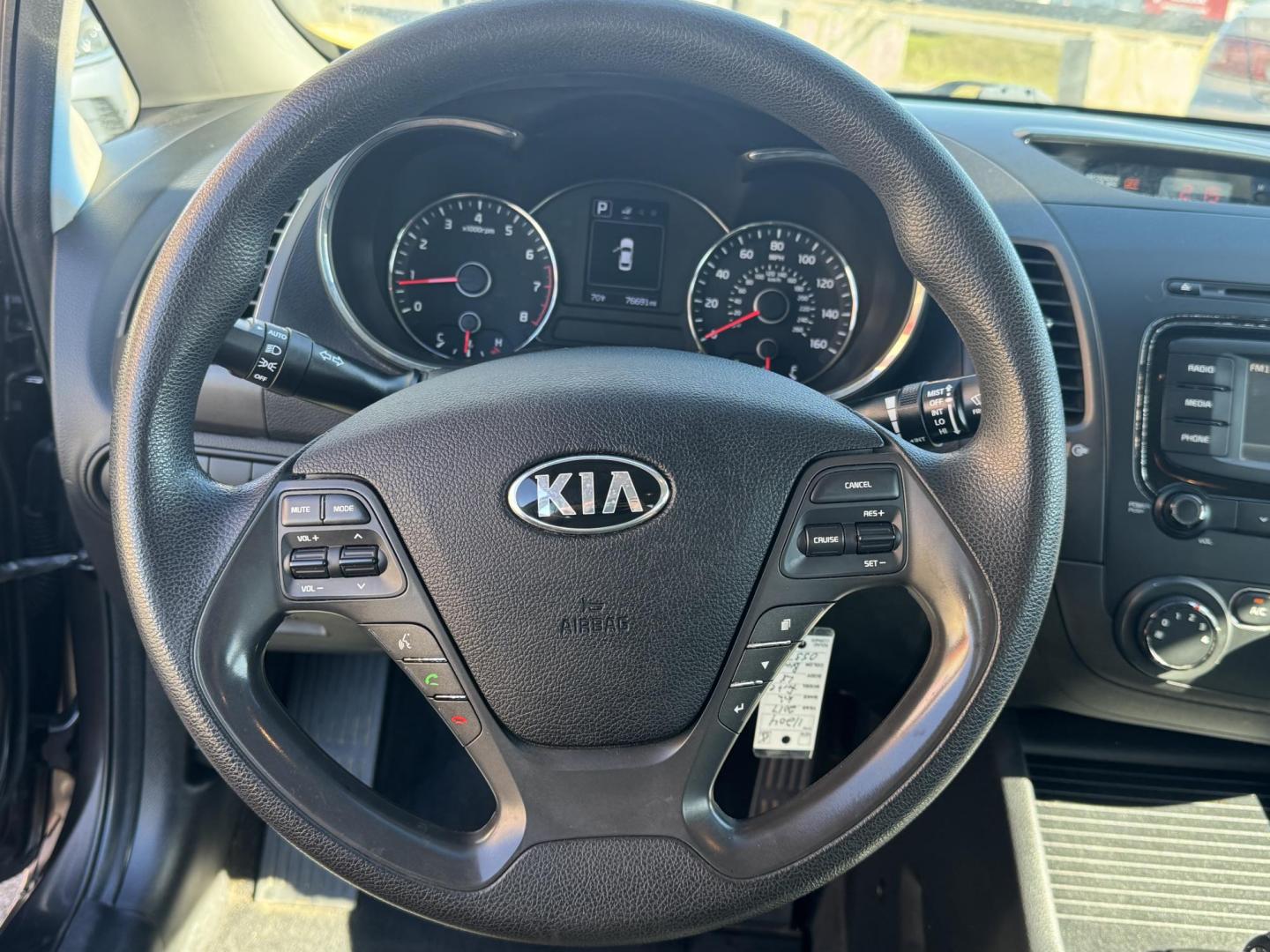 2017 Brown Kia Forte (3KPFL4A73HE) with an 4-Cyl, 2.0 Liter engine, Automatic, 6-Spd transmission, located at 8008 Warden Rd, Sherwood, AR, 72120, (501) 801-6100, 34.830078, -92.186684 - Photo#16