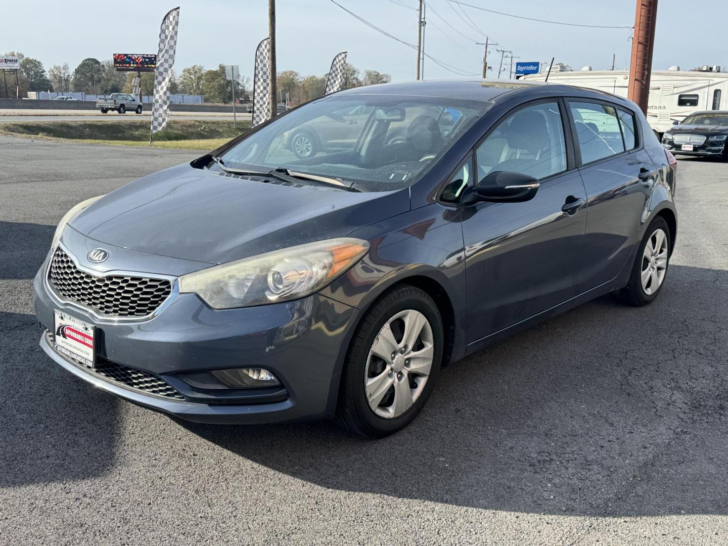 2016 Blue Kia Forte5 (KNAFK5A85G5) with an 4-Cyl, GDI, 2.0 Liter engine, Auto, 6-Spd w/Sportmatic and Active ECO System transmission, located at 8008 Warden Rd, Sherwood, AR, 72120, (501) 801-6100, 34.830078, -92.186684 - Photo#3