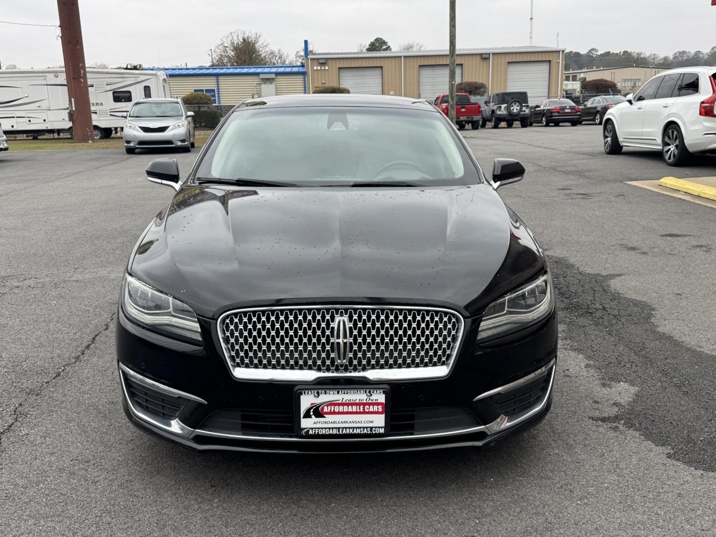 2017 Black Lincoln MKZ (3LN6L5E93HR) with an 4-Cyl, EcoBoost, 2.0L engine, Auto, 6-Spd SelectShift transmission, located at 8008 Warden Rd, Sherwood, AR, 72120, (501) 801-6100, 34.830078, -92.186684 - Photo#2