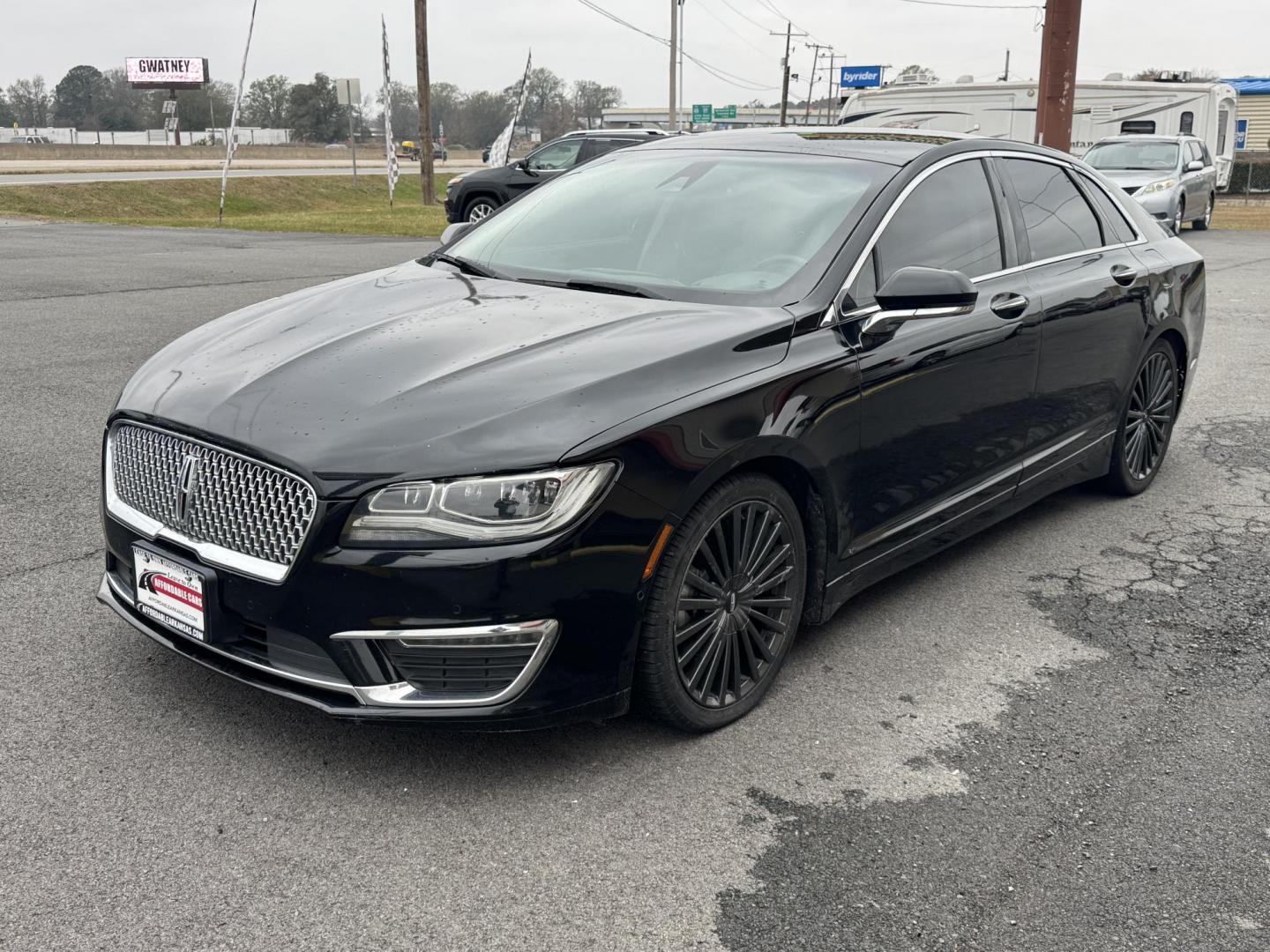 2017 Black Lincoln MKZ (3LN6L5E93HR) with an 4-Cyl, EcoBoost, 2.0L engine, Auto, 6-Spd SelectShift transmission, located at 8008 Warden Rd, Sherwood, AR, 72120, (501) 801-6100, 34.830078, -92.186684 - Photo#3