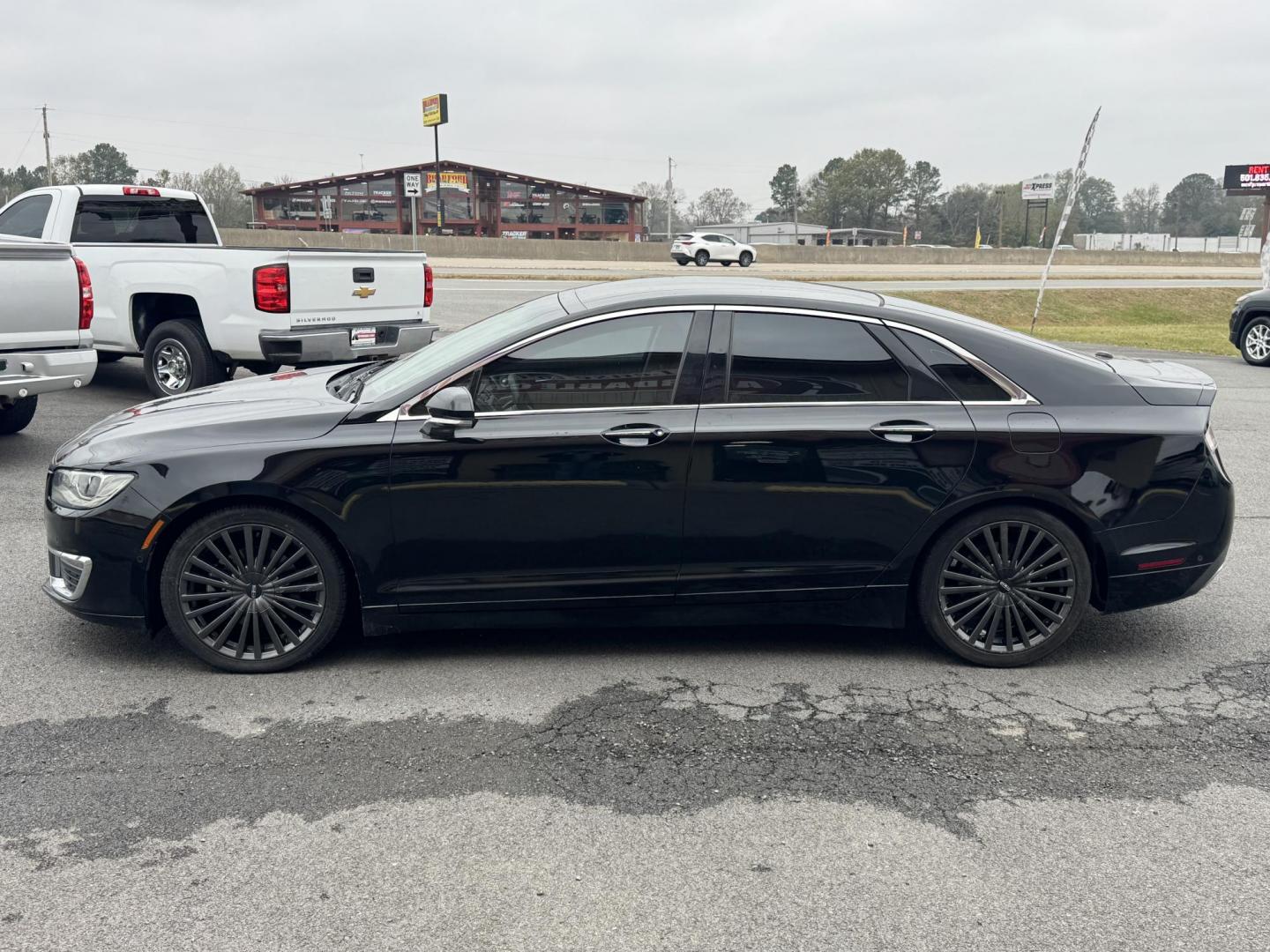 2017 Black Lincoln MKZ (3LN6L5E93HR) with an 4-Cyl, EcoBoost, 2.0L engine, Auto, 6-Spd SelectShift transmission, located at 8008 Warden Rd, Sherwood, AR, 72120, (501) 801-6100, 34.830078, -92.186684 - Photo#4