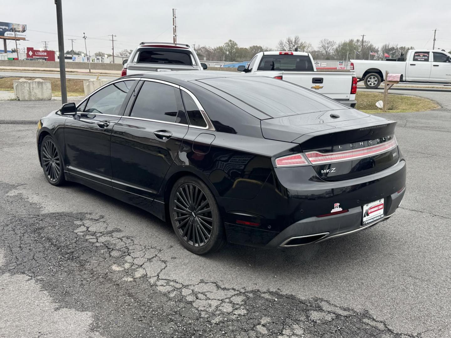 2017 Black Lincoln MKZ (3LN6L5E93HR) with an 4-Cyl, EcoBoost, 2.0L engine, Auto, 6-Spd SelectShift transmission, located at 8008 Warden Rd, Sherwood, AR, 72120, (501) 801-6100, 34.830078, -92.186684 - Photo#5