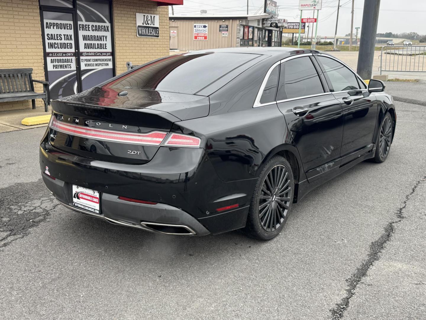 2017 Black Lincoln MKZ (3LN6L5E93HR) with an 4-Cyl, EcoBoost, 2.0L engine, Auto, 6-Spd SelectShift transmission, located at 8008 Warden Rd, Sherwood, AR, 72120, (501) 801-6100, 34.830078, -92.186684 - Photo#7