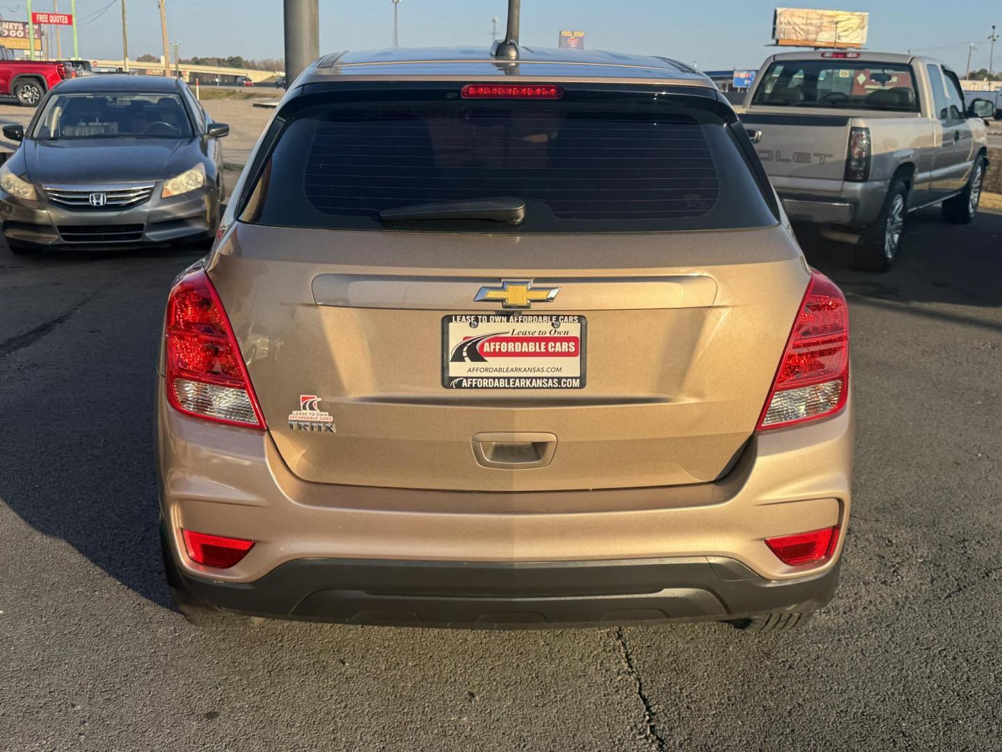 2018 Brown Chevrolet Trax (3GNCJKSB4JL) with an 4-Cyl, ECOTEC Turbo, 1.4L engine, Automatic, 6-Spd transmission, located at 8008 Warden Rd, Sherwood, AR, 72120, (501) 801-6100, 34.830078, -92.186684 - Photo#6