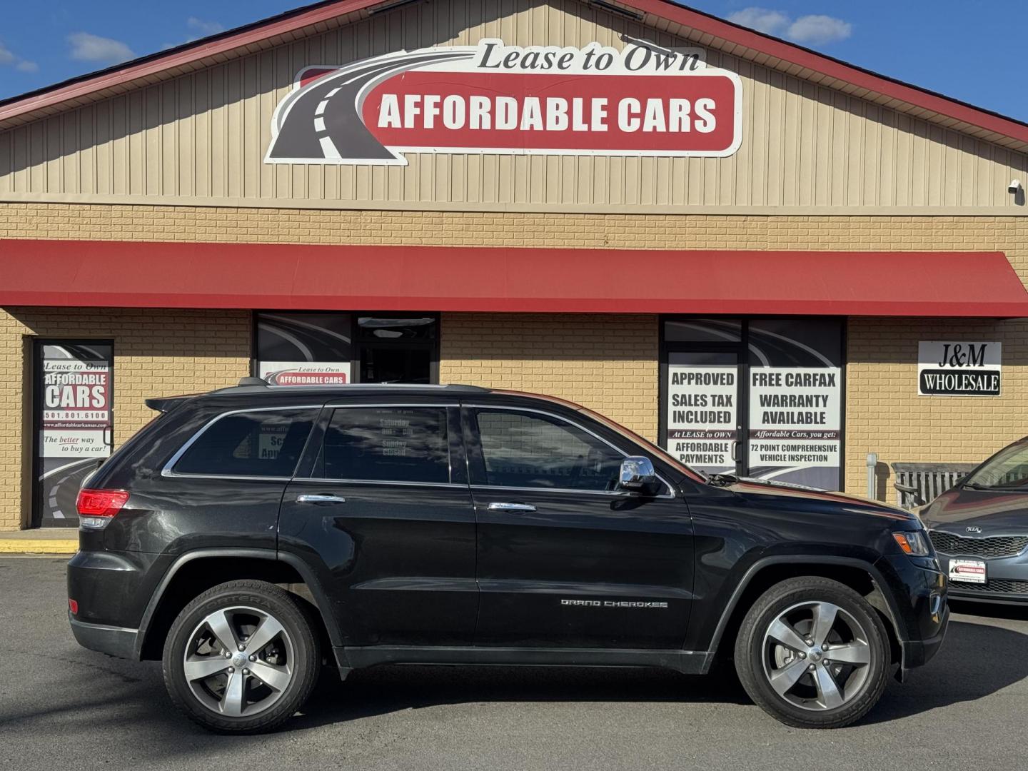 2014 Black Jeep Grand Cherokee (1C4RJFBG7EC) with an V6, Flex Fuel, 3.6 Liter engine, Automatic, 8-Spd transmission, located at 8008 Warden Rd, Sherwood, AR, 72120, (501) 801-6100, 34.830078, -92.186684 - Photo#0