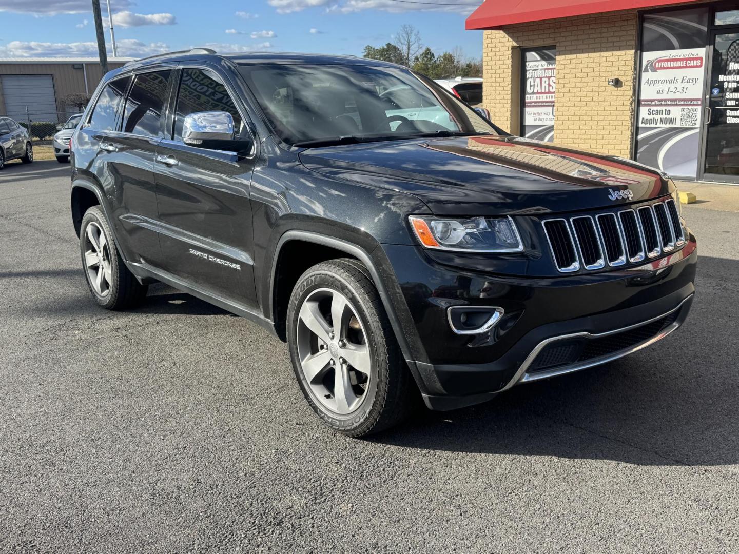2014 Black Jeep Grand Cherokee (1C4RJFBG7EC) with an V6, Flex Fuel, 3.6 Liter engine, Automatic, 8-Spd transmission, located at 8008 Warden Rd, Sherwood, AR, 72120, (501) 801-6100, 34.830078, -92.186684 - Photo#1