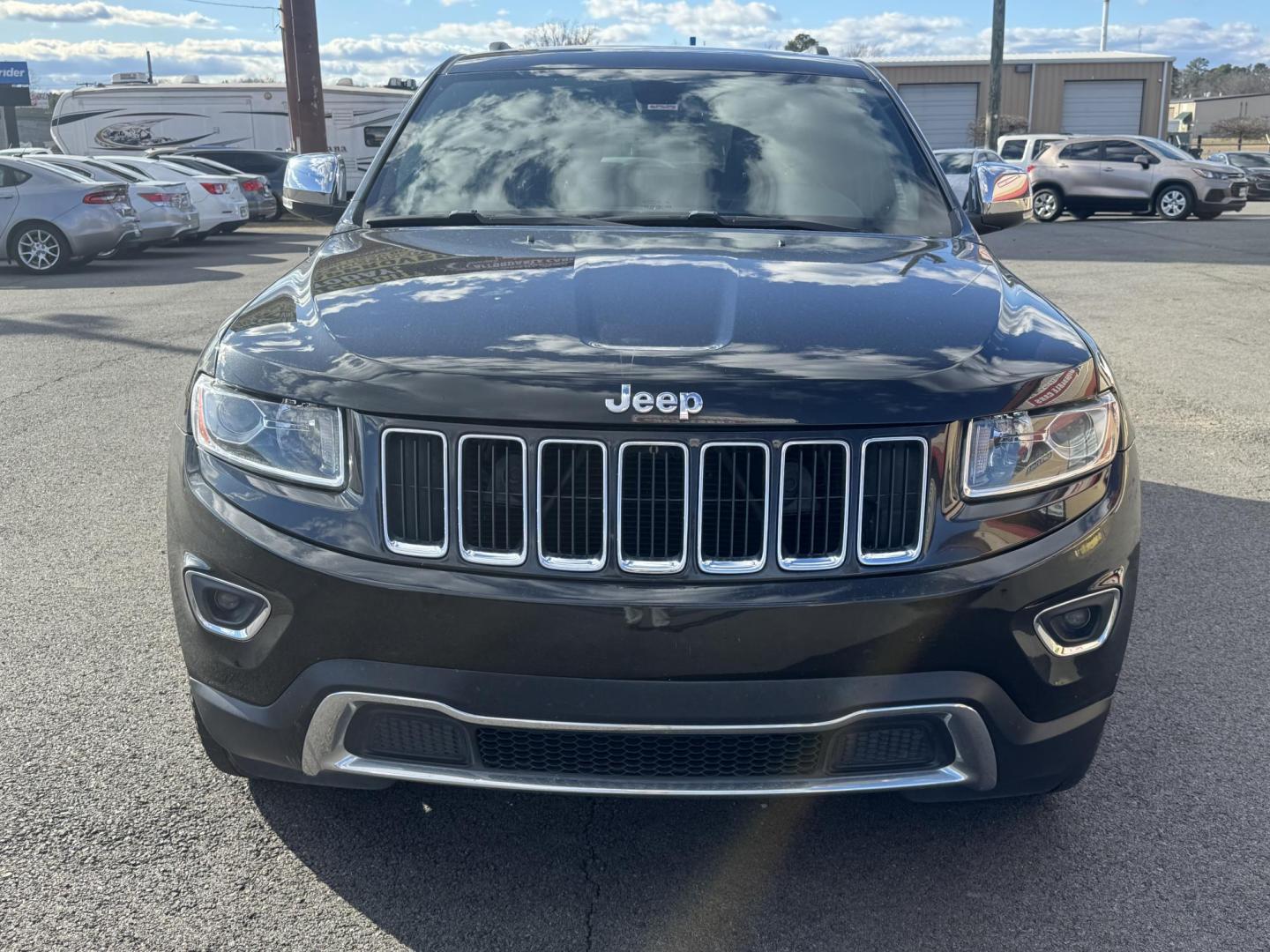 2014 Black Jeep Grand Cherokee (1C4RJFBG7EC) with an V6, Flex Fuel, 3.6 Liter engine, Automatic, 8-Spd transmission, located at 8008 Warden Rd, Sherwood, AR, 72120, (501) 801-6100, 34.830078, -92.186684 - Photo#2