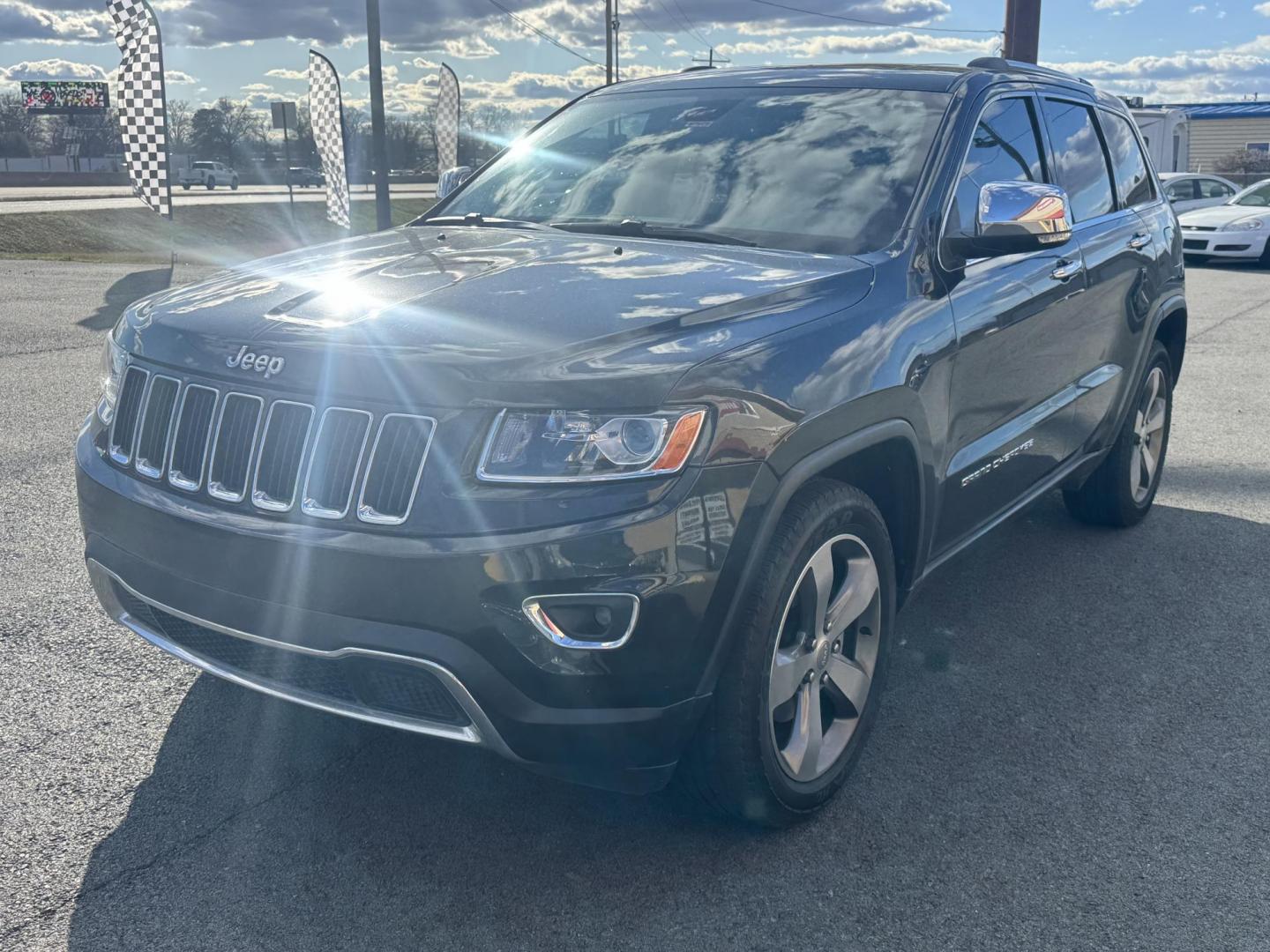 2014 Black Jeep Grand Cherokee (1C4RJFBG7EC) with an V6, Flex Fuel, 3.6 Liter engine, Automatic, 8-Spd transmission, located at 8008 Warden Rd, Sherwood, AR, 72120, (501) 801-6100, 34.830078, -92.186684 - Photo#3