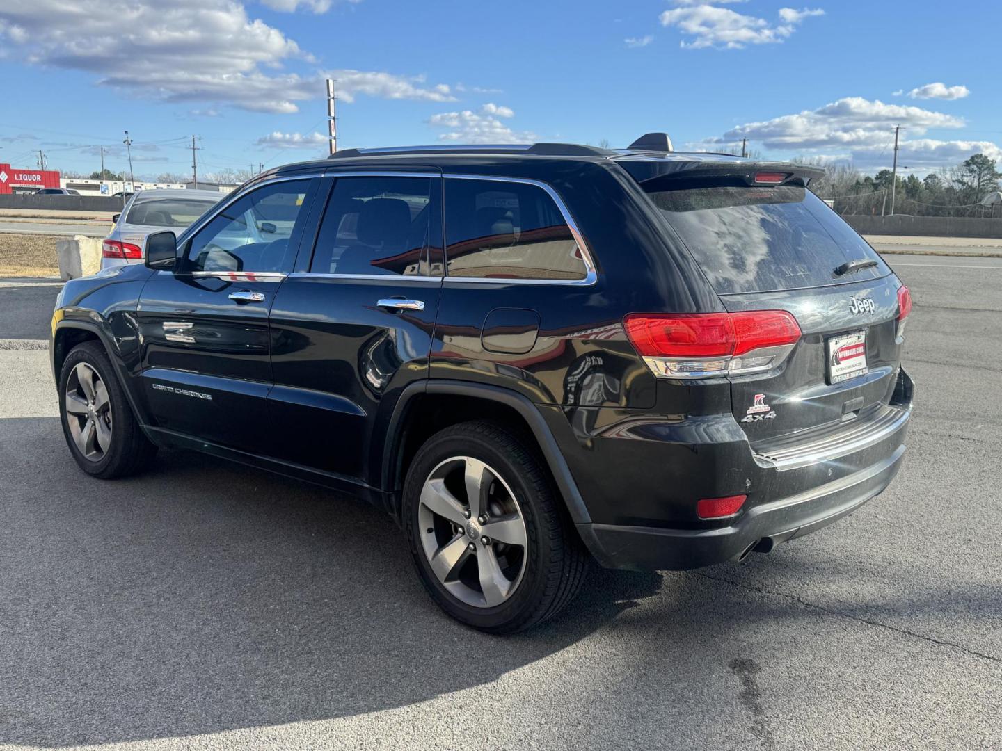 2014 Black Jeep Grand Cherokee (1C4RJFBG7EC) with an V6, Flex Fuel, 3.6 Liter engine, Automatic, 8-Spd transmission, located at 8008 Warden Rd, Sherwood, AR, 72120, (501) 801-6100, 34.830078, -92.186684 - Photo#5