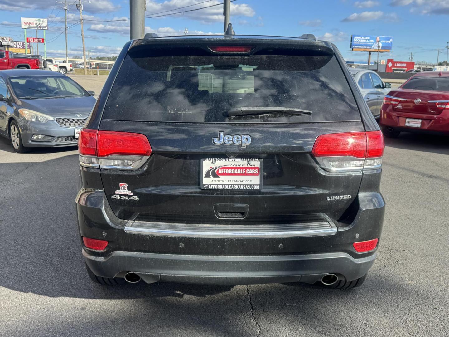 2014 Black Jeep Grand Cherokee (1C4RJFBG7EC) with an V6, Flex Fuel, 3.6 Liter engine, Automatic, 8-Spd transmission, located at 8008 Warden Rd, Sherwood, AR, 72120, (501) 801-6100, 34.830078, -92.186684 - Photo#6