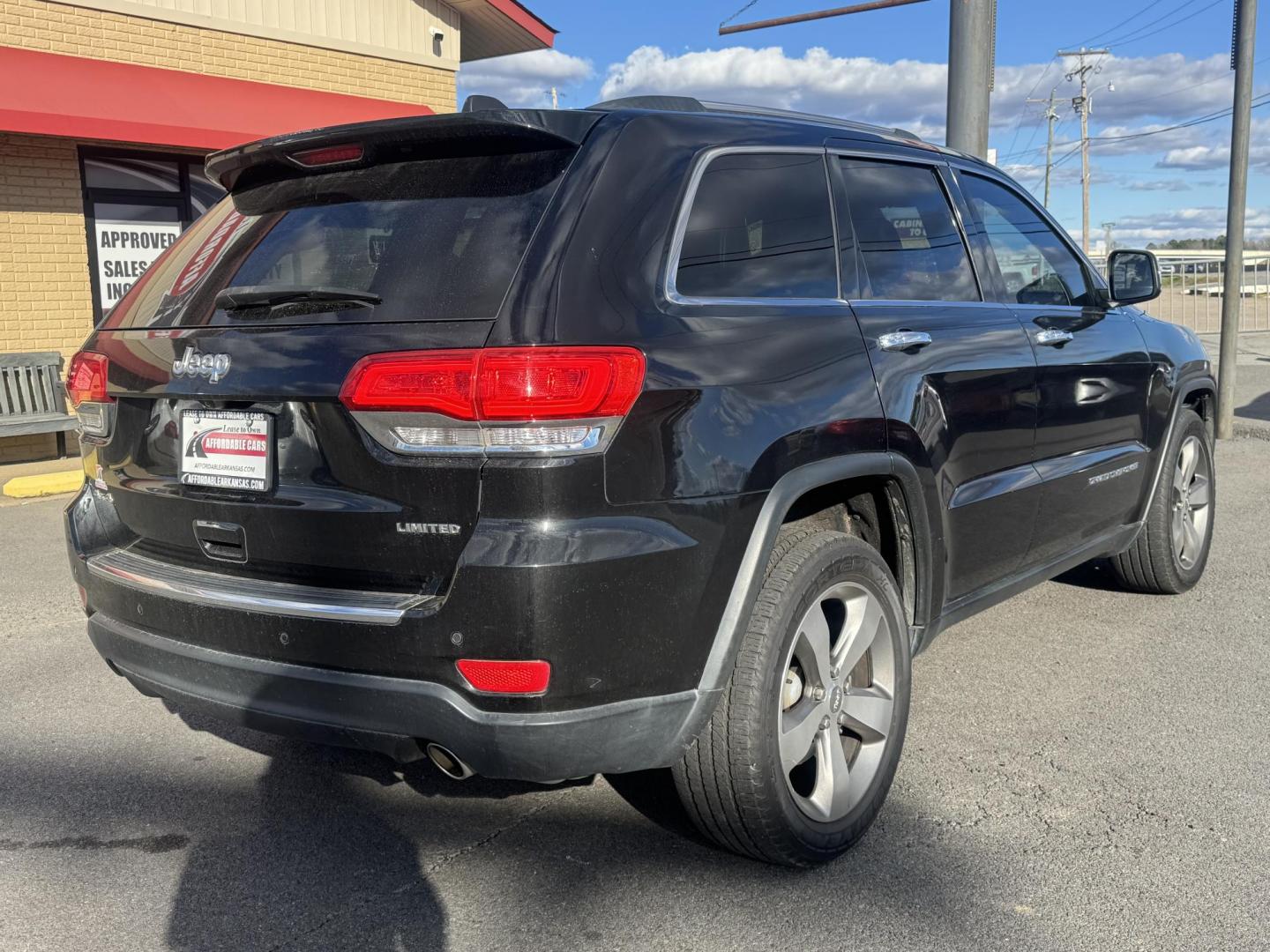 2014 Black Jeep Grand Cherokee (1C4RJFBG7EC) with an V6, Flex Fuel, 3.6 Liter engine, Automatic, 8-Spd transmission, located at 8008 Warden Rd, Sherwood, AR, 72120, (501) 801-6100, 34.830078, -92.186684 - Photo#7