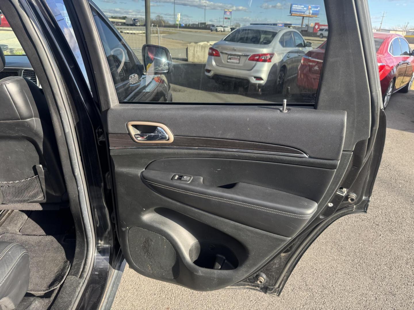 2014 Black Jeep Grand Cherokee (1C4RJFBG7EC) with an V6, Flex Fuel, 3.6 Liter engine, Automatic, 8-Spd transmission, located at 8008 Warden Rd, Sherwood, AR, 72120, (501) 801-6100, 34.830078, -92.186684 - Photo#9