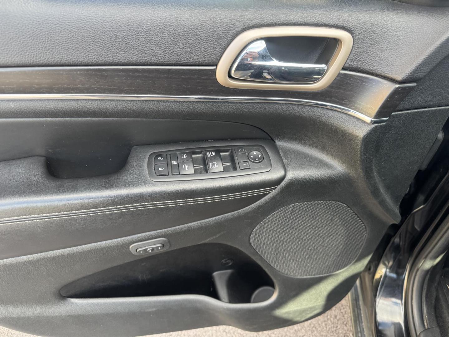 2014 Black Jeep Grand Cherokee (1C4RJFBG7EC) with an V6, Flex Fuel, 3.6 Liter engine, Automatic, 8-Spd transmission, located at 8008 Warden Rd, Sherwood, AR, 72120, (501) 801-6100, 34.830078, -92.186684 - Photo#14