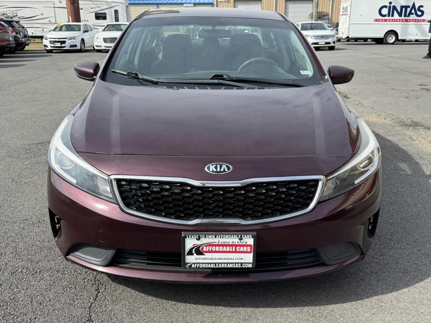 2017 Maroon Kia Forte (3KPFK4A72HE) with an 4-Cyl, 2.0 Liter engine, Automatic, 6-Spd transmission, located at 8008 Warden Rd, Sherwood, AR, 72120, (501) 801-6100, 34.830078, -92.186684 - Photo#2