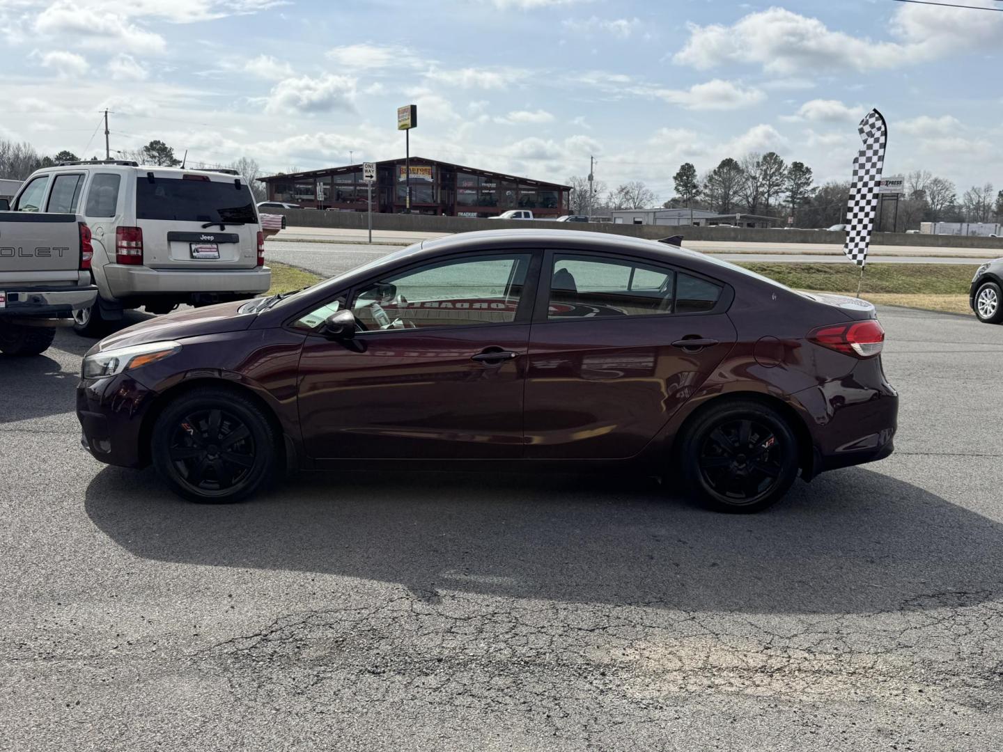 2017 Maroon Kia Forte (3KPFK4A72HE) with an 4-Cyl, 2.0 Liter engine, Automatic, 6-Spd transmission, located at 8008 Warden Rd, Sherwood, AR, 72120, (501) 801-6100, 34.830078, -92.186684 - Photo#4