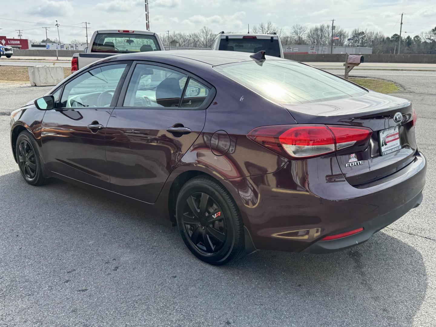 2017 Maroon Kia Forte (3KPFK4A72HE) with an 4-Cyl, 2.0 Liter engine, Automatic, 6-Spd transmission, located at 8008 Warden Rd, Sherwood, AR, 72120, (501) 801-6100, 34.830078, -92.186684 - Photo#5
