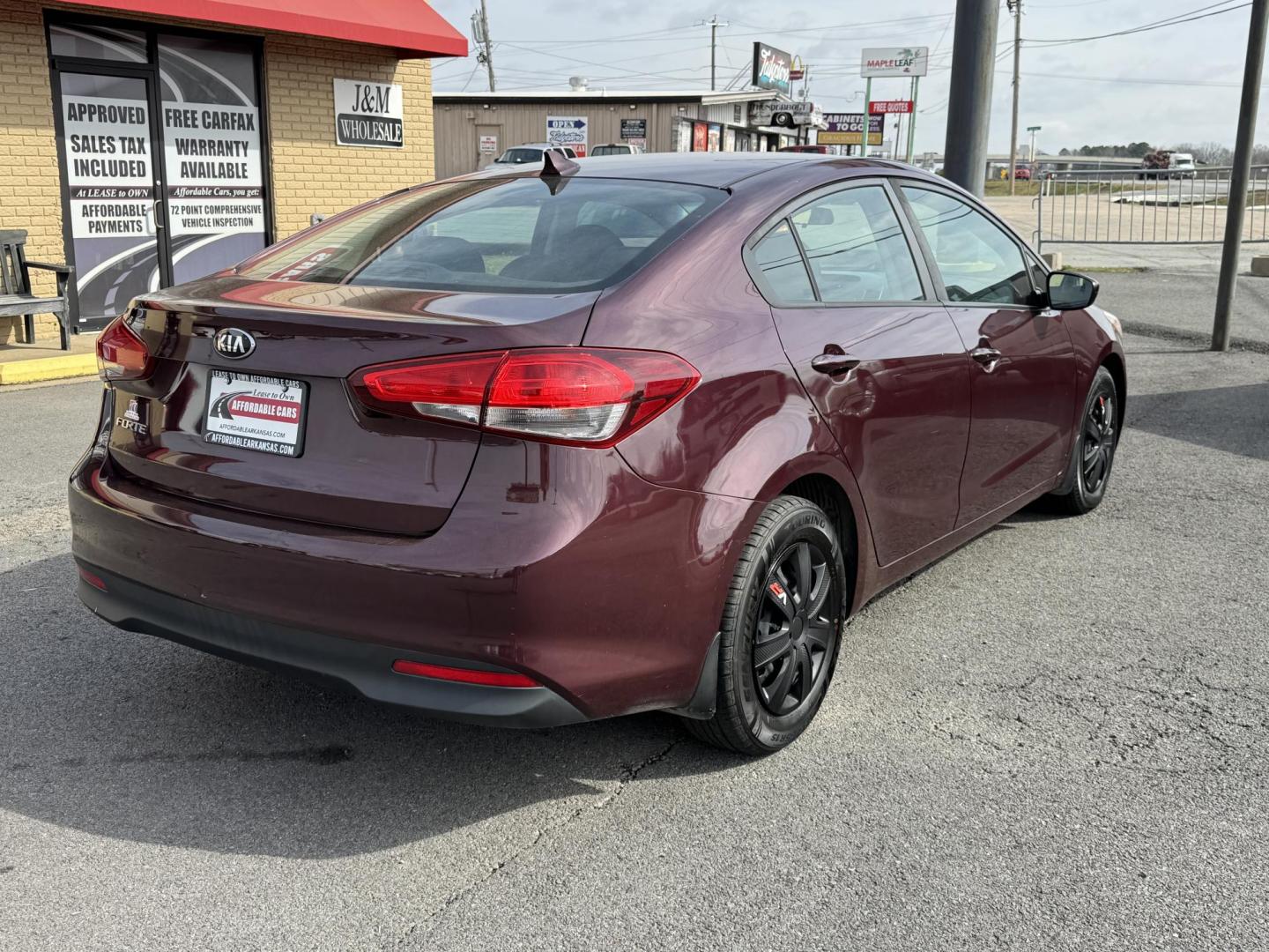 2017 Maroon Kia Forte (3KPFK4A72HE) with an 4-Cyl, 2.0 Liter engine, Automatic, 6-Spd transmission, located at 8008 Warden Rd, Sherwood, AR, 72120, (501) 801-6100, 34.830078, -92.186684 - Photo#7