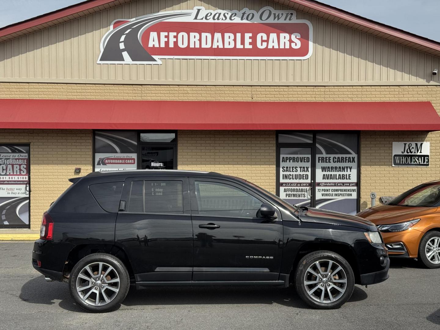 2016 Black Jeep Compass (1C4NJCBA7GD) with an 4-Cyl, 2.4 Liter engine, Auto, 6-Spd AutoStick transmission, located at 8008 Warden Rd, Sherwood, AR, 72120, (501) 801-6100, 34.830078, -92.186684 - Photo#0