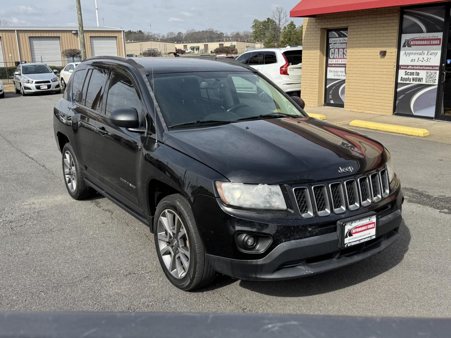 2016 Black Jeep Compass (1C4NJCBA7GD) with an 4-Cyl, 2.4 Liter engine, Auto, 6-Spd AutoStick transmission, located at 8008 Warden Rd, Sherwood, AR, 72120, (501) 801-6100, 34.830078, -92.186684 - Photo#1