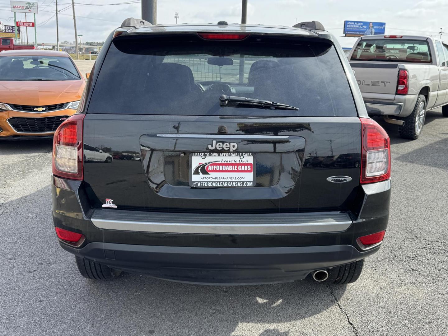 2016 Black Jeep Compass (1C4NJCBA7GD) with an 4-Cyl, 2.4 Liter engine, Auto, 6-Spd AutoStick transmission, located at 8008 Warden Rd, Sherwood, AR, 72120, (501) 801-6100, 34.830078, -92.186684 - Photo#6