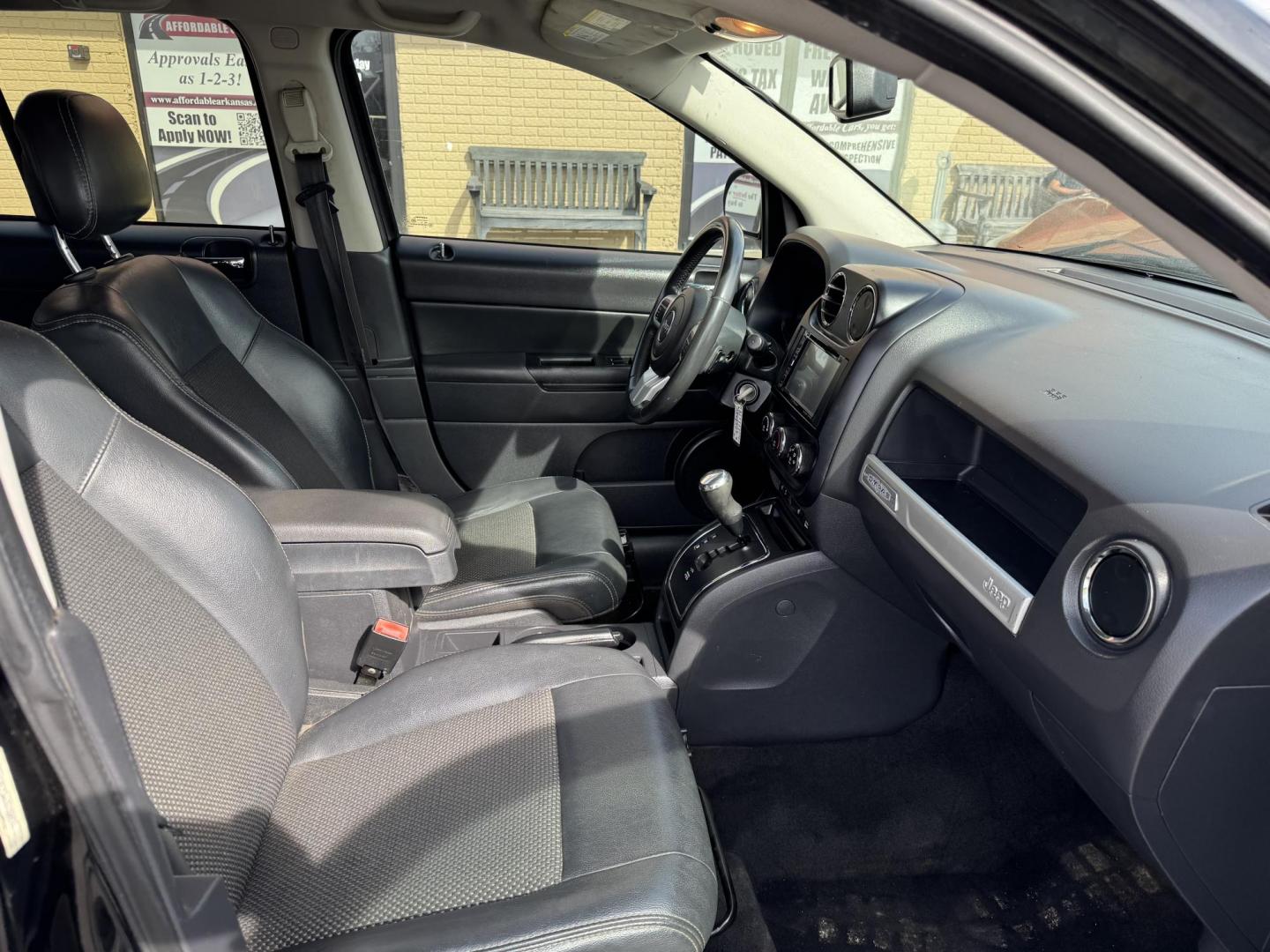 2016 Black Jeep Compass (1C4NJCBA7GD) with an 4-Cyl, 2.4 Liter engine, Auto, 6-Spd AutoStick transmission, located at 8008 Warden Rd, Sherwood, AR, 72120, (501) 801-6100, 34.830078, -92.186684 - Photo#8