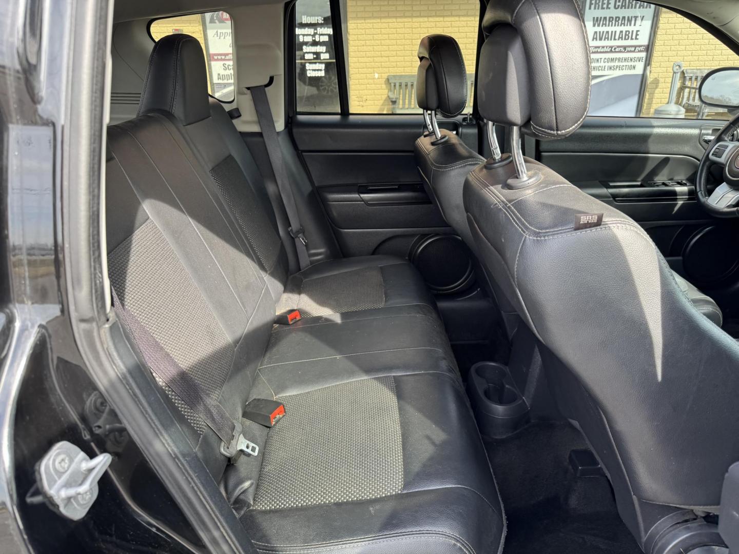 2016 Black Jeep Compass (1C4NJCBA7GD) with an 4-Cyl, 2.4 Liter engine, Auto, 6-Spd AutoStick transmission, located at 8008 Warden Rd, Sherwood, AR, 72120, (501) 801-6100, 34.830078, -92.186684 - Photo#9