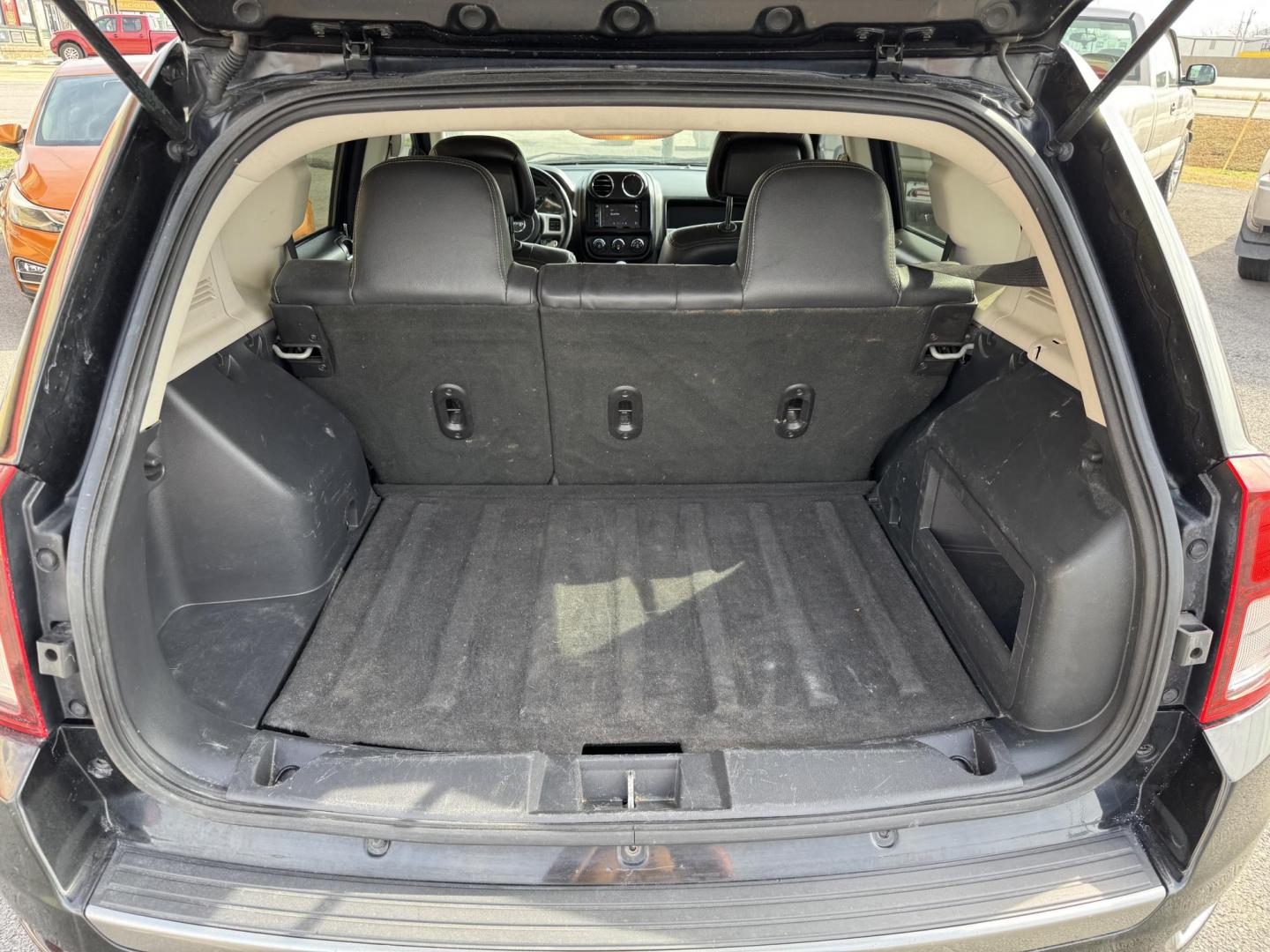 2016 Black Jeep Compass (1C4NJCBA7GD) with an 4-Cyl, 2.4 Liter engine, Auto, 6-Spd AutoStick transmission, located at 8008 Warden Rd, Sherwood, AR, 72120, (501) 801-6100, 34.830078, -92.186684 - Photo#10