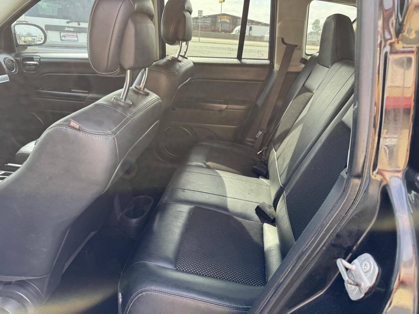 2016 Black Jeep Compass (1C4NJCBA7GD) with an 4-Cyl, 2.4 Liter engine, Auto, 6-Spd AutoStick transmission, located at 8008 Warden Rd, Sherwood, AR, 72120, (501) 801-6100, 34.830078, -92.186684 - Photo#11