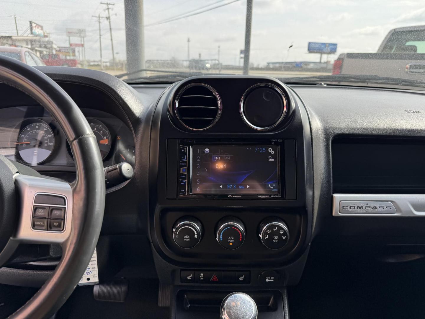 2016 Black Jeep Compass (1C4NJCBA7GD) with an 4-Cyl, 2.4 Liter engine, Auto, 6-Spd AutoStick transmission, located at 8008 Warden Rd, Sherwood, AR, 72120, (501) 801-6100, 34.830078, -92.186684 - Photo#15