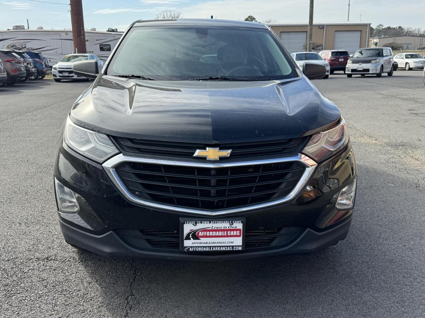 2018 Black Chevrolet Equinox (2GNAXHEV2J6) with an 4-Cyl, Turbo, 1.5 Liter engine, Automatic, 6-Spd w/Overdrive transmission, located at 8008 Warden Rd, Sherwood, AR, 72120, (501) 801-6100, 34.830078, -92.186684 - Photo#2