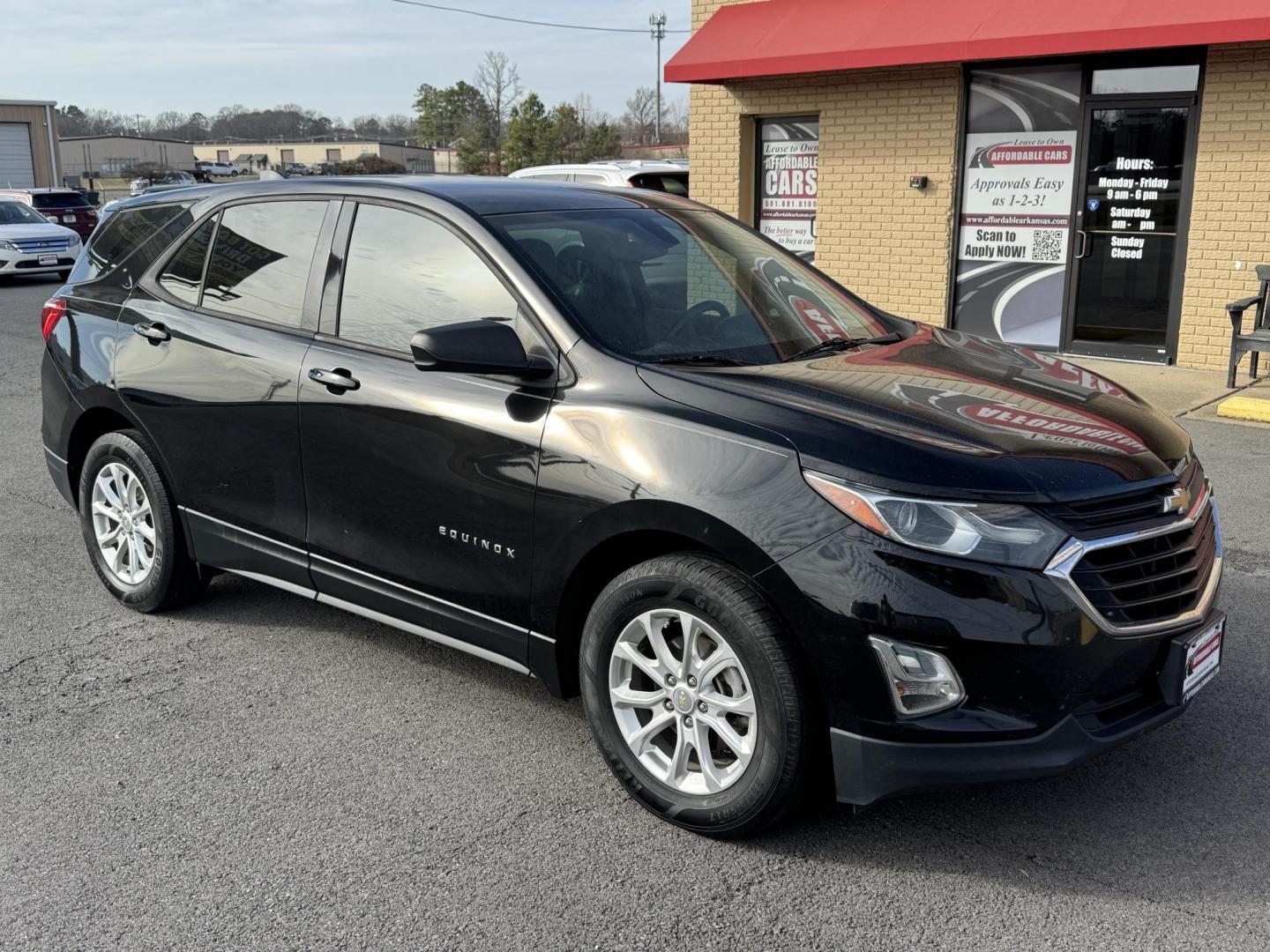 2018 Black Chevrolet Equinox (2GNAXHEV2J6) with an 4-Cyl, Turbo, 1.5 Liter engine, Automatic, 6-Spd w/Overdrive transmission, located at 8008 Warden Rd, Sherwood, AR, 72120, (501) 801-6100, 34.830078, -92.186684 - Photo#1