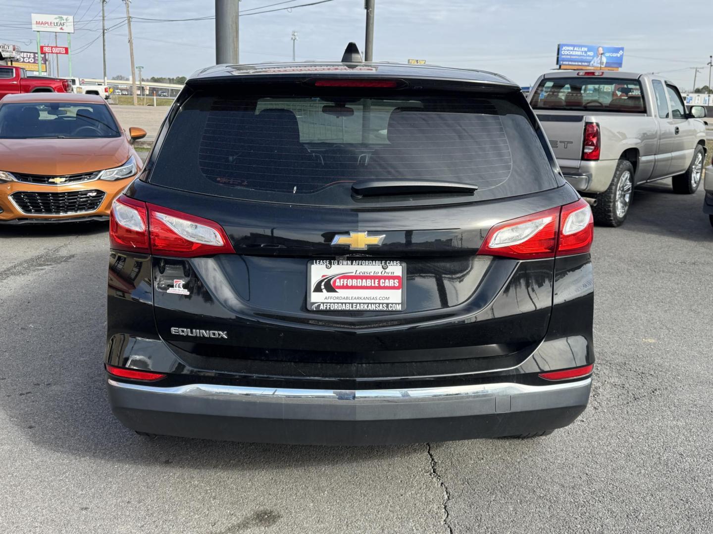2018 Black Chevrolet Equinox (2GNAXHEV2J6) with an 4-Cyl, Turbo, 1.5 Liter engine, Automatic, 6-Spd w/Overdrive transmission, located at 8008 Warden Rd, Sherwood, AR, 72120, (501) 801-6100, 34.830078, -92.186684 - Photo#6