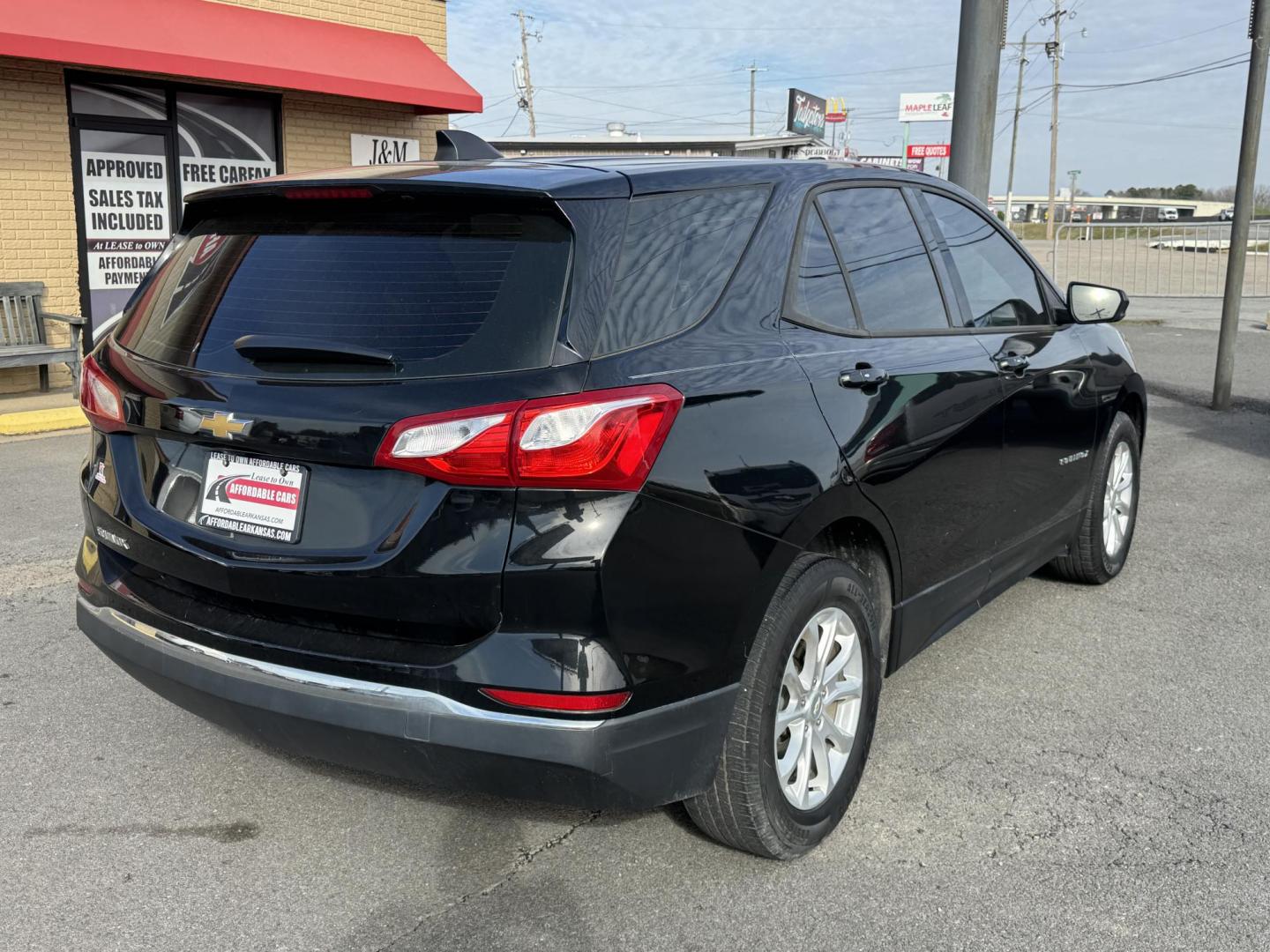 2018 Black Chevrolet Equinox (2GNAXHEV2J6) with an 4-Cyl, Turbo, 1.5 Liter engine, Automatic, 6-Spd w/Overdrive transmission, located at 8008 Warden Rd, Sherwood, AR, 72120, (501) 801-6100, 34.830078, -92.186684 - Photo#7