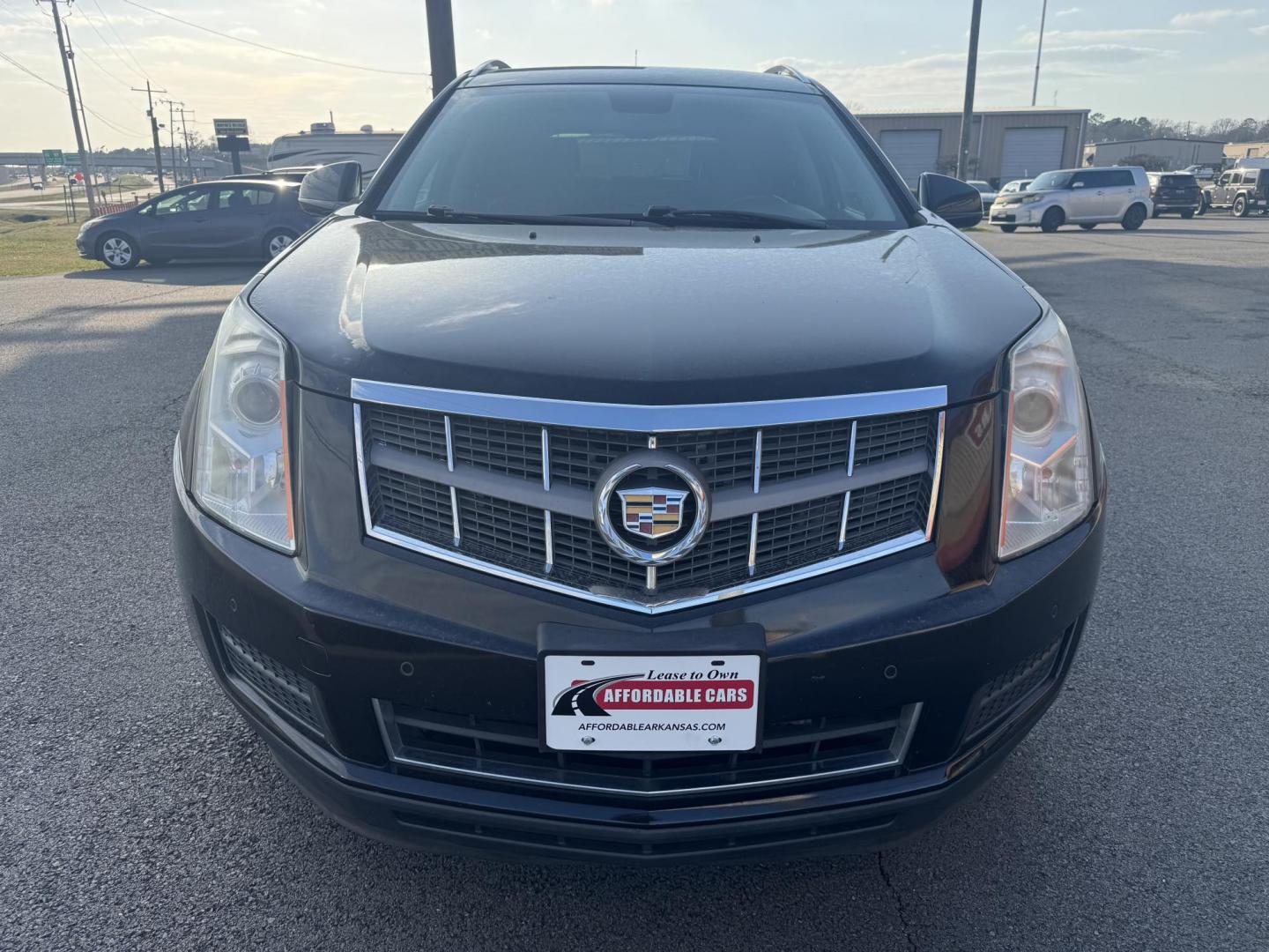 2012 Black Cadillac SRX (3GYFNAE38CS) with an V6, Flex Fuel, 3.6 Liter engine, Auto, 6-Spd w/TAPshift transmission, located at 8008 Warden Rd, Sherwood, AR, 72120, (501) 801-6100, 34.830078, -92.186684 - Photo#2