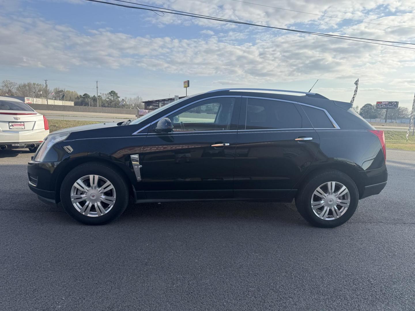 2012 Black Cadillac SRX (3GYFNAE38CS) with an V6, Flex Fuel, 3.6 Liter engine, Auto, 6-Spd w/TAPshift transmission, located at 8008 Warden Rd, Sherwood, AR, 72120, (501) 801-6100, 34.830078, -92.186684 - Photo#3