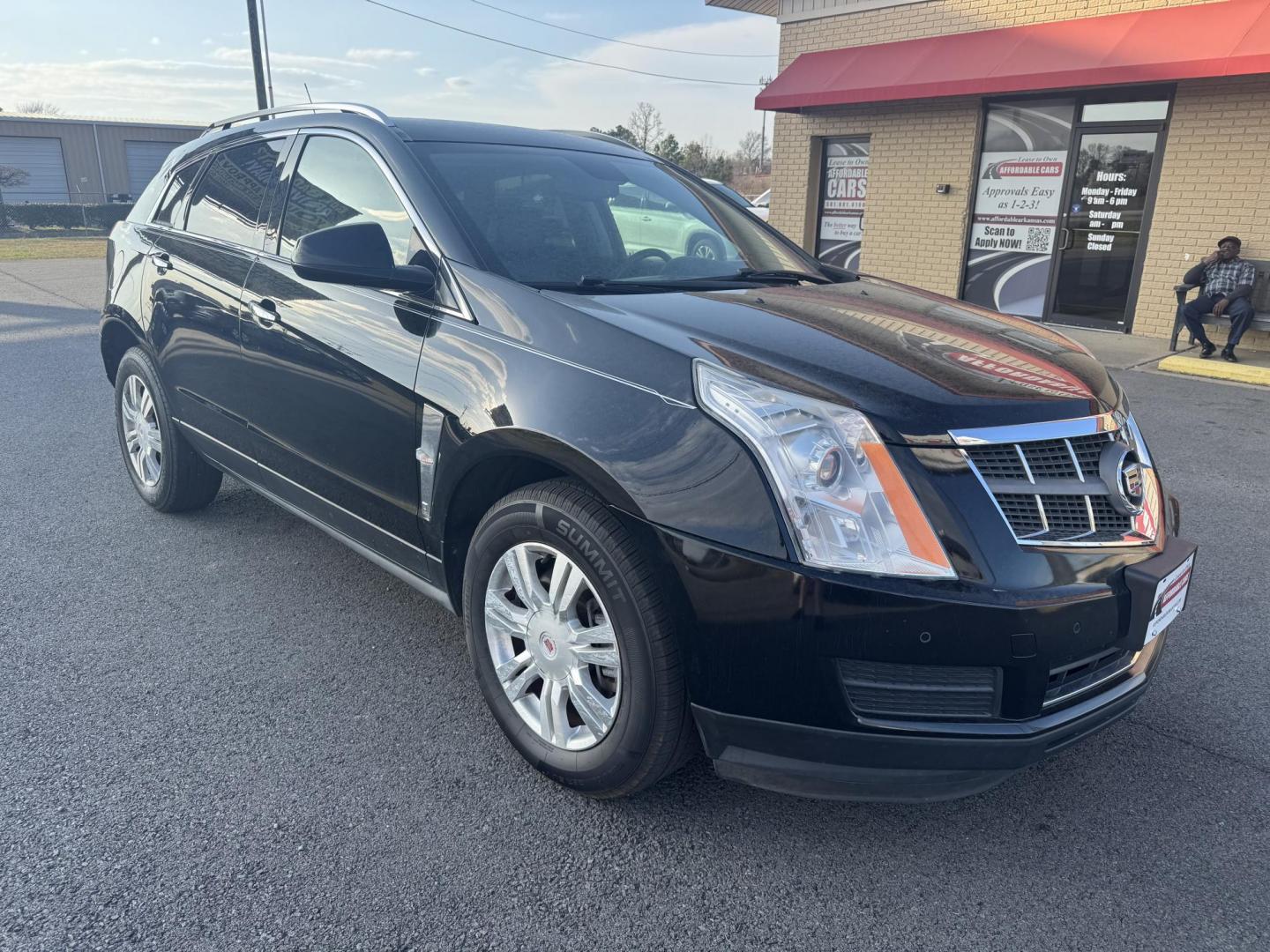 2012 Black Cadillac SRX (3GYFNAE38CS) with an V6, Flex Fuel, 3.6 Liter engine, Auto, 6-Spd w/TAPshift transmission, located at 8008 Warden Rd, Sherwood, AR, 72120, (501) 801-6100, 34.830078, -92.186684 - Photo#1
