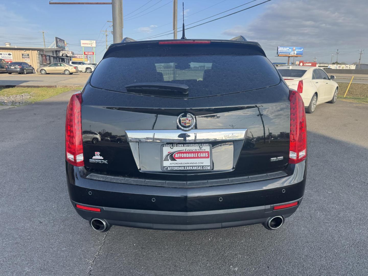 2012 Black Cadillac SRX (3GYFNAE38CS) with an V6, Flex Fuel, 3.6 Liter engine, Auto, 6-Spd w/TAPshift transmission, located at 8008 Warden Rd, Sherwood, AR, 72120, (501) 801-6100, 34.830078, -92.186684 - Photo#6