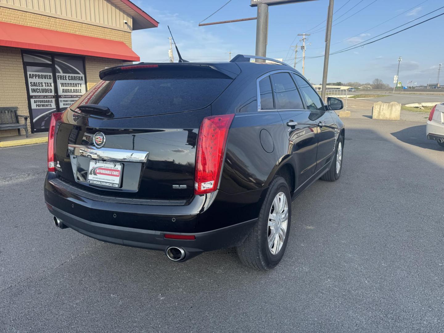 2012 Black Cadillac SRX (3GYFNAE38CS) with an V6, Flex Fuel, 3.6 Liter engine, Auto, 6-Spd w/TAPshift transmission, located at 8008 Warden Rd, Sherwood, AR, 72120, (501) 801-6100, 34.830078, -92.186684 - Photo#7