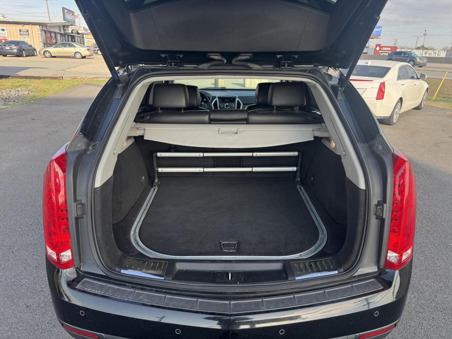 2012 Black Cadillac SRX (3GYFNAE38CS) with an V6, Flex Fuel, 3.6 Liter engine, Auto, 6-Spd w/TAPshift transmission, located at 8008 Warden Rd, Sherwood, AR, 72120, (501) 801-6100, 34.830078, -92.186684 - Photo#10