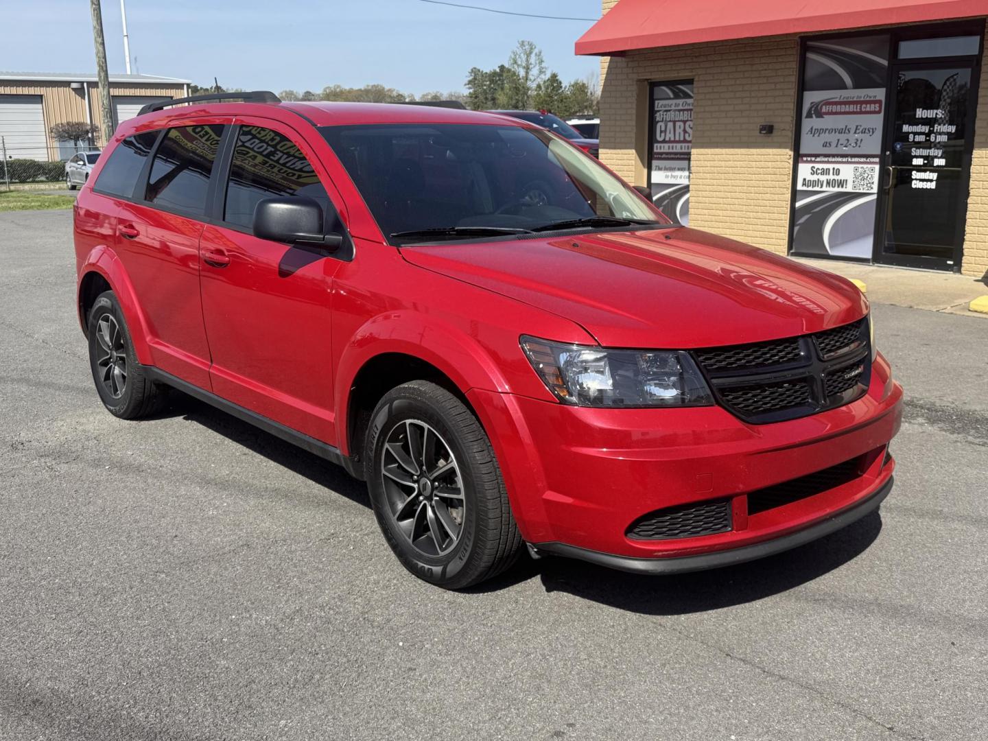 2018 Red Dodge Journey (3C4PDCAB8JT) with an 4-Cyl, 2.4 Liter engine, Automatic, 4-Spd w/AutoStick transmission, located at 8008 Warden Rd, Sherwood, AR, 72120, (501) 801-6100, 34.830078, -92.186684 - Photo#1