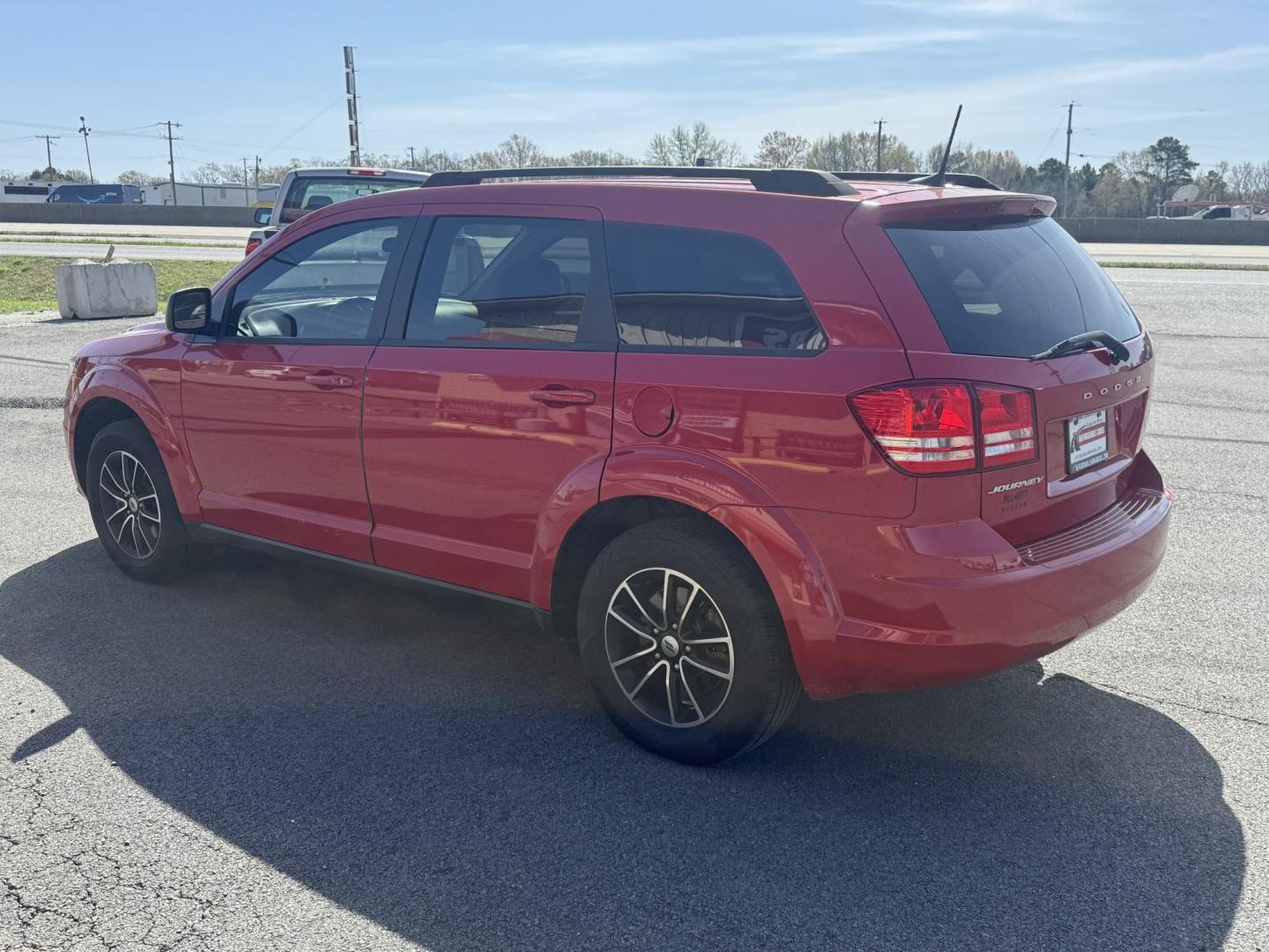 2018 Red Dodge Journey (3C4PDCAB8JT) with an 4-Cyl, 2.4 Liter engine, Automatic, 4-Spd w/AutoStick transmission, located at 8008 Warden Rd, Sherwood, AR, 72120, (501) 801-6100, 34.830078, -92.186684 - Photo#5