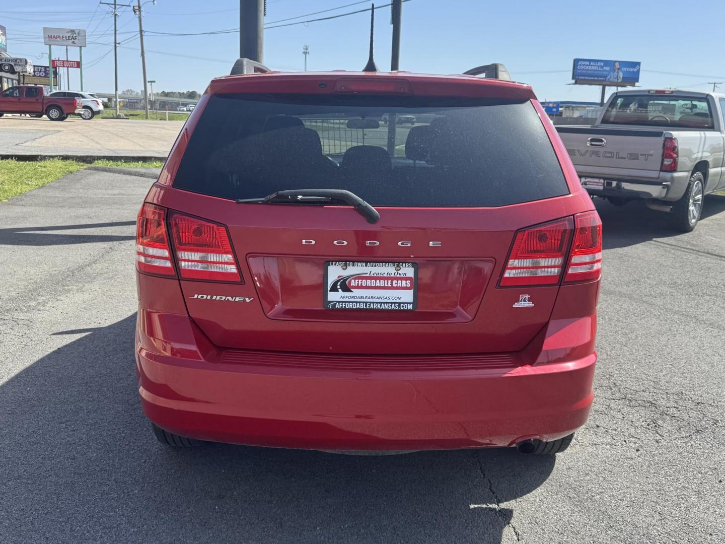 2018 Red Dodge Journey (3C4PDCAB8JT) with an 4-Cyl, 2.4 Liter engine, Automatic, 4-Spd w/AutoStick transmission, located at 8008 Warden Rd, Sherwood, AR, 72120, (501) 801-6100, 34.830078, -92.186684 - Photo#6