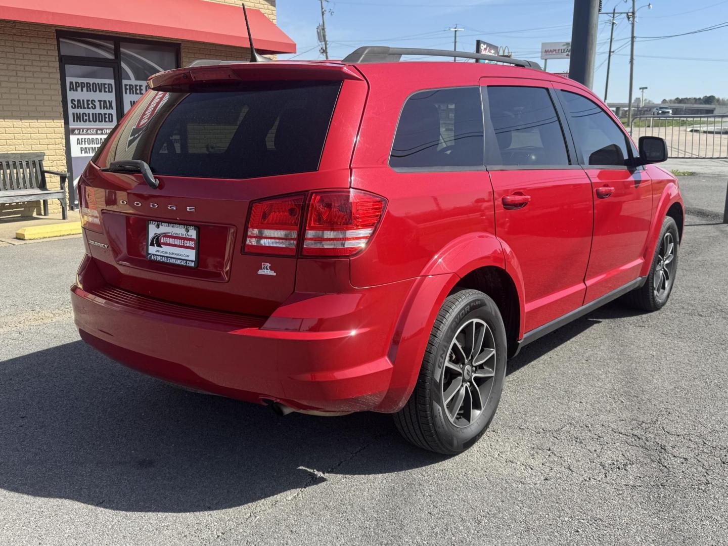 2018 Red Dodge Journey (3C4PDCAB8JT) with an 4-Cyl, 2.4 Liter engine, Automatic, 4-Spd w/AutoStick transmission, located at 8008 Warden Rd, Sherwood, AR, 72120, (501) 801-6100, 34.830078, -92.186684 - Photo#7