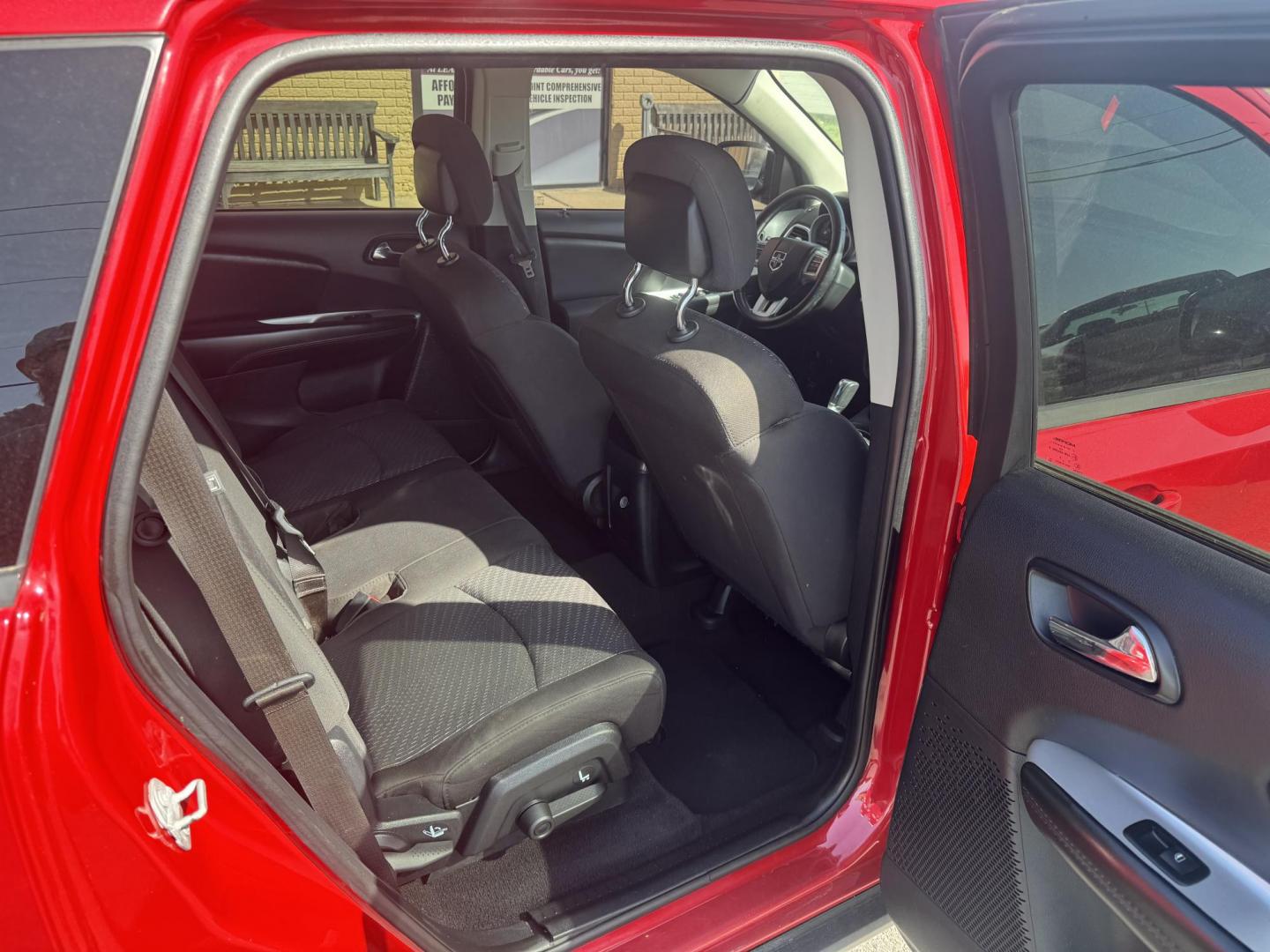 2018 Red Dodge Journey (3C4PDCAB8JT) with an 4-Cyl, 2.4 Liter engine, Automatic, 4-Spd w/AutoStick transmission, located at 8008 Warden Rd, Sherwood, AR, 72120, (501) 801-6100, 34.830078, -92.186684 - Photo#9
