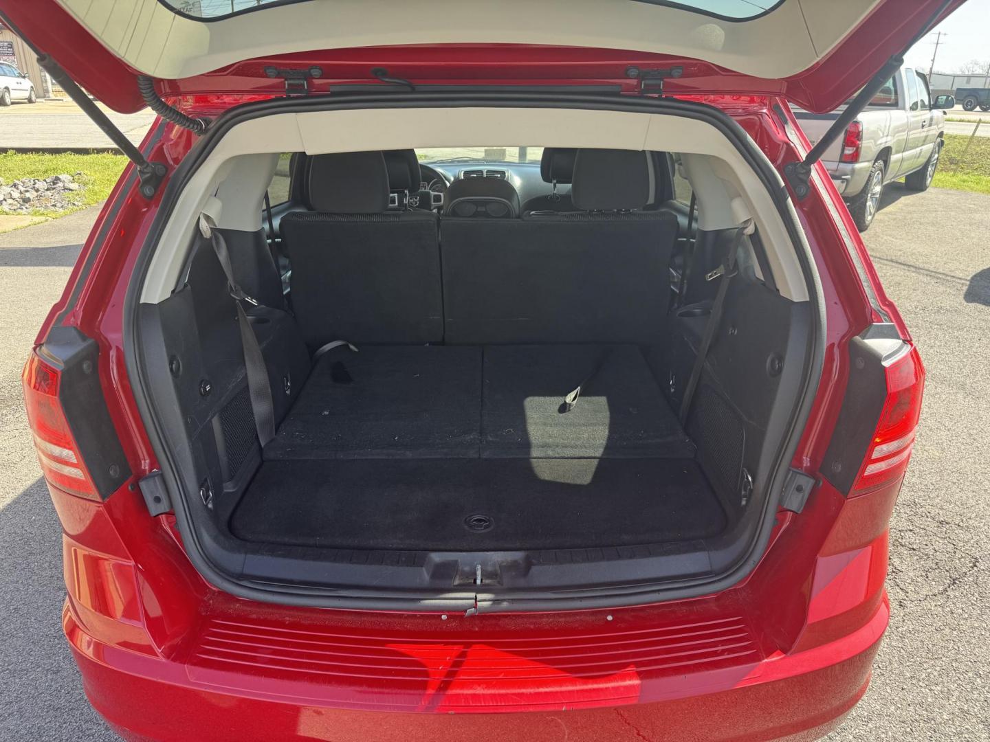 2018 Red Dodge Journey (3C4PDCAB8JT) with an 4-Cyl, 2.4 Liter engine, Automatic, 4-Spd w/AutoStick transmission, located at 8008 Warden Rd, Sherwood, AR, 72120, (501) 801-6100, 34.830078, -92.186684 - Photo#10